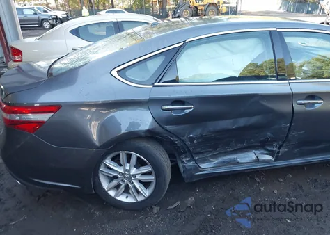 2015 Toyota Avalon Xle z USA, uszkodzony, nr VIN 4T1BK1EB4FU143498